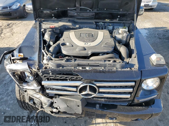 2015 Mercedes-Benz G 550 z VIN WDCYC3HF4FX239064, wystawiony jako Copart lot #77151664 z przebiegiem 65 854 mil mil oraz Szkoda całkowita • Salvage title. Historia ofert i sprzedaży dostępna na DreamBid. Obrazek 12.