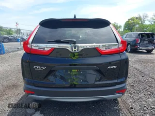 2019 Honda CR-V LX z VIN 2HKRW6H31KH208188, wystawiony jako IAAI lot #42235856 z przebiegiem 140 067 mil mil oraz . Historia ofert i sprzedaży dostępna na DreamBid. Obrazek 16.
