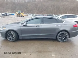 2019 Ford Fusion SEL with VIN 3FA6P0CD6KR141832, listed as a IAAI auction lot 41800102 with 142,282 mi miles and . Bid and sale history available at DreamBid. Image 15.