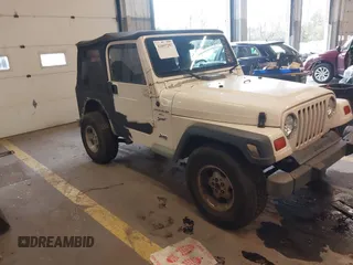 1999 Jeep Wrangler Sport with VIN 1J4FY19S6XP449014, listed as a IAAI auction lot 41893297 with 181,114 mi miles. Bid and sale history available at carsss.com. Image 1.