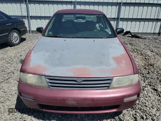 1995 Nissan Altima XE z VIN 1N4BU31D8SC164328, wystawiony jako Copart lot #65999624 z przebiegiem 196 247 mil mil oraz Szkoda całkowita • Salvage title. Historia ofert i sprzedaży dostępna na DreamBid. Obrazek 5.