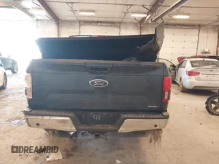 2018 Ford F-150 XL with VIN 1FTEW1EP4JFA00923, listed as a IAAI auction lot 41506293 with 153,523 mi miles and . Bid and sale history available at DreamBid. Image 16.
