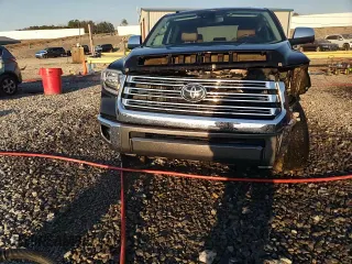 2019 Toyota Tundra SR5 z VIN 5TFAY5F13KX832503, wystawiony jako Copart lot #46536825 z przebiegiem 128 063 mil mil oraz Szkoda całkowita • Salvage title. Historia ofert i sprzedaży dostępna na DreamBid. Obrazek 14.