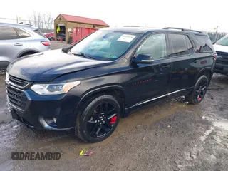 2019 Chevrolet Traverse Premier with VIN 1GNEVKKW3KJ281770, listed as a IAAI auction lot 41632230 with 92,850 mi miles. Bid and sale history available at carsss.com. Image 2.