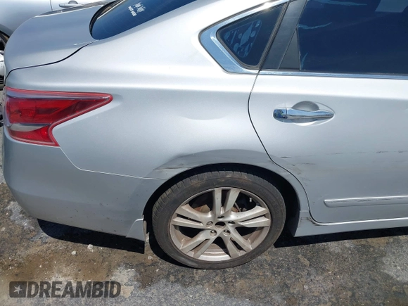 2013 Nissan Altima SV z VIN 1N4BL3AP3DN425384, wystawiony jako IAAI lot #42471028 z przebiegiem 154 095 mil mil oraz . Historia ofert i sprzedaży dostępna na DreamBid. Obrazek 14.