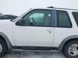 1998 Ford Explorer Sport z VIN 1FMYU24X4WUB60583, wystawiony jako IAAI lot #41611027 z przebiegiem 197 653 mil mil oraz . Historia ofert i sprzedaży dostępna na DreamBid. Obrazek 14.