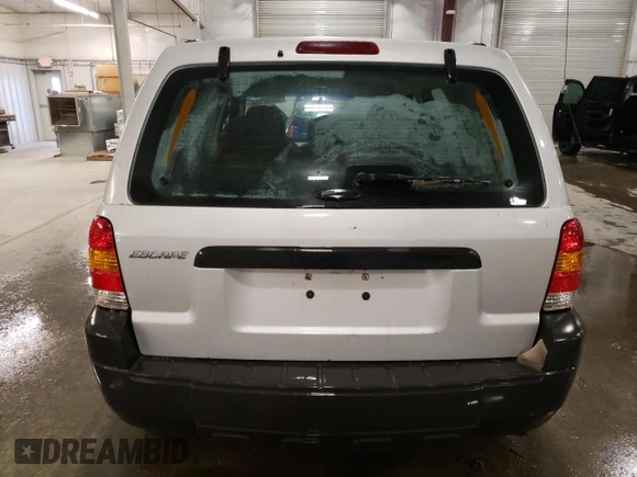 2007 Ford Escape XLS with VIN 1FMCU92Z77KA84801, listed as a Copart auction lot 82052144 with 180,774 mi miles and Salvage title. Bid and sale history available at DreamBid. Image 6.