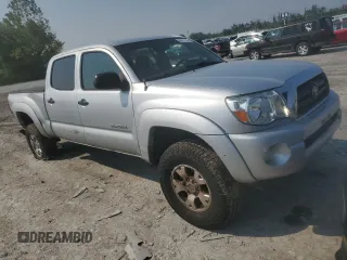 2005 Toyota Tacoma with VIN 5TEMU52N35Z040382, listed as a Copart auction lot 59977195 with 325,475 mi miles and Salvage title. Bid and sale history available at DreamBid. Image 4.