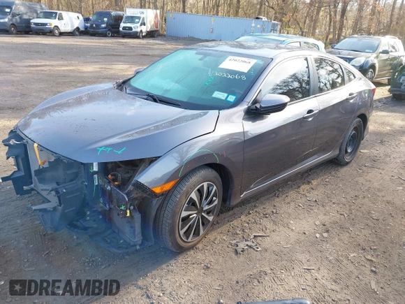 2017 Honda Civic Sedan LX with VIN 19XFC2F56HE233741, listed as a IAAI auction lot 42022068 with 65,587 mi miles. Bid and sale history available at carsss.com. Image 18.