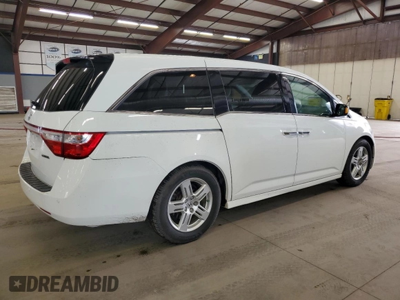 2011 Honda Odyssey Touring Elite with VIN 5FNRL5H90BB083092, listed as a Copart auction lot 54178785 with 135,765 mi miles and Salvage Title. Bid and sale history available at DreamBid. Image 3.