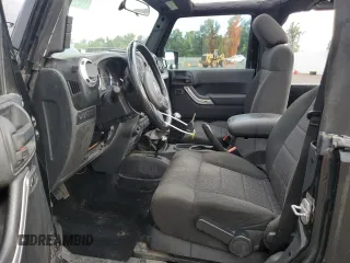 2011 Jeep Wrangler Rubicon with VIN 1J4BA6D12BL507652, listed as a Copart auction lot 69989964 with 127,493 mi miles and Salvage title. Bid and sale history available at DreamBid. Image 7.