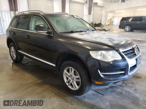 2009 Volkswagen Touareg VR6 z VIN WVGBE77L29D015958, wystawiony jako Copart lot #52019505 z przebiegiem 179 339 mil mil oraz Czysty tytuł • Clean title. Historia ofert i sprzedaży dostępna na DreamBid. Obrazek 4.