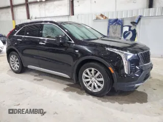 2020 Cadillac XT4 FWD Premium Luxury z VIN 1GYFZCR41LF143039, wystawiony jako Copart lot #57164005 z przebiegiem 24 218 mil mil oraz Nie do naprawy • Non repairable. Historia ofert i sprzedaży dostępna na DreamBid. Obrazek 4.