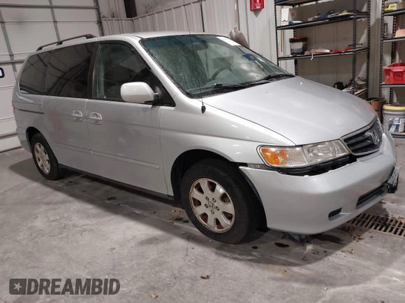 2003 Honda Odyssey EX with VIN 5FNRL18673B009670, listed as a IAAI auction lot 42130172 with 218,391 mi miles and . Bid and sale history available at DreamBid. Image 1.