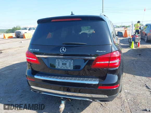 2018 Mercedes-Benz GLS 450 with VIN 4JGDF6EE1JB075332, listed as a IAAI auction lot 42120007 with 111,559 mi miles and . Bid and sale history available at DreamBid. Image 16.