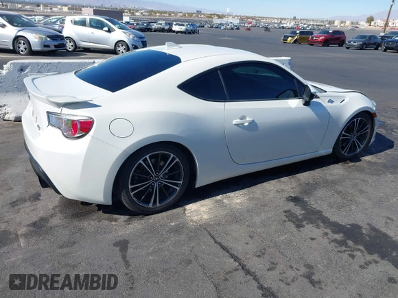 2015 Scion FR-S with VIN JF1ZNAA12F9709707, listed as a IAAI auction lot 41545940 with 107,575 mi miles. Bid and sale history available at carsss.com. Image 4.