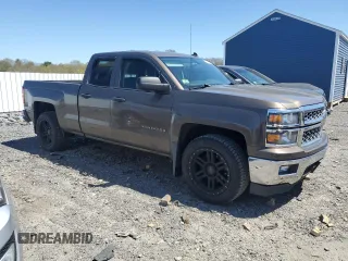 2014 Chevrolet Silverado 1500 LT with VIN 1GCRCREHXEZ197974, listed as a Copart auction lot 54946335 with 143,376 mi miles and Clean Title. Bid and sale history available at DreamBid. Image 4.