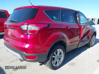 2017 Ford Escape SE z VIN 1FMCU9G9XHUE08239, wystawiony jako IAAI lot #42326698 z przebiegiem 96 471 mil mil oraz . Historia ofert i sprzedaży dostępna na DreamBid. Obrazek 4.