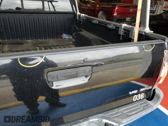 2013 Toyota Tacoma with VIN 5TFMU4FNXDX013268, listed as a IAAI auction lot 42631333 with 298,790 mi miles and . Bid and sale history available at DreamBid. Image 3.