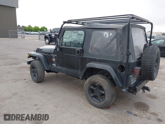 2000 Jeep Wrangler Sahara with VIN 1J4FA59S7YP805628, listed as a IAAI auction lot 42259201 with Not provided miles and . Bid and sale history available at DreamBid. Image 3.