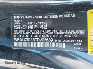2012 BMW 6 Series 650i with VIN WBALX3C56CDV77689, listed as a IAAI auction lot 41840326 with 92,218 mi miles. Bid and sale history available at carsss.com. Image 9.