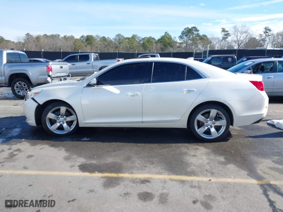 2014 Chevrolet Malibu LTZ with VIN 1G11J5SXXEF114531, listed as a IAAI auction lot 41409618 with 153,040 mi miles. Bid and sale history available at carsss.com. Image 15.