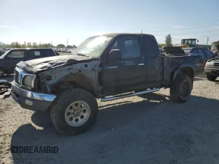 2002 Toyota Tacoma z VIN 5TEWN72N72Z142975, wystawiony jako Copart lot #56288475 z przebiegiem 187 341 mil mil oraz Czysty tytuł • Clean title. Historia ofert i sprzedaży dostępna na DreamBid. Obrazek 1.