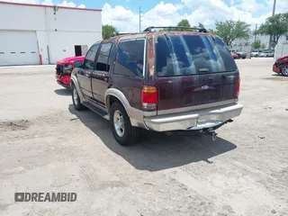 1999 Ford Explorer XLT z VIN 1FMDU32P2XUC31708, wystawiony jako IAAI lot #42243725 z przebiegiem 239 411 mil mil oraz . Historia ofert i sprzedaży dostępna na DreamBid. Obrazek 3.