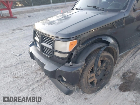 2010 Dodge Nitro SE with VIN 1D4PT2GK3AW137797, listed as a IAAI auction lot 41689701 with 182,452 mi miles. Bid and sale history available at carsss.com. Image 14.