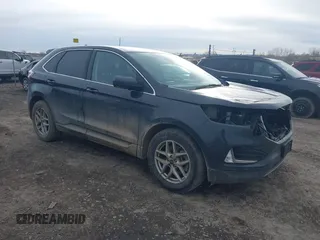 2021 Ford Edge SEL z VIN 2FMPK4J93MBA05027, wystawiony jako IAAI lot #41802022 z przebiegiem 82 614 mil mil oraz . Historia ofert i sprzedaży dostępna na DreamBid. Obrazek 1.