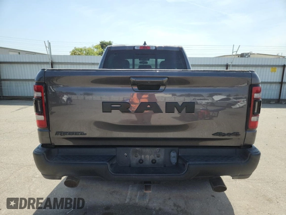 2019 Ram 1500 Rebel z VIN 1C6SRFET7KN875819, wystawiony jako Copart lot #57805775 z przebiegiem 80 521 mil mil oraz Szkoda całkowita • Salvage title. Historia ofert i sprzedaży dostępna na DreamBid. Obrazek 6.