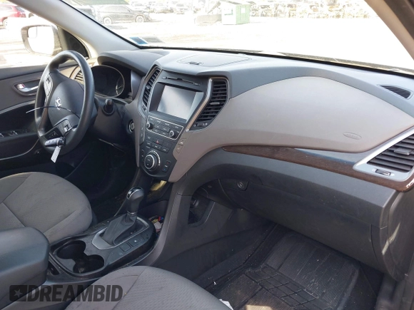 2018 Hyundai Santa Fe 2.4L z VIN 5NMZUDLB7JH077241, wystawiony jako IAAI lot #42135854 z przebiegiem 59 819 mil mil oraz . Historia ofert i sprzedaży dostępna na DreamBid. Obrazek 5.