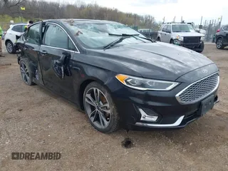 2020 Ford Fusion Titanium with VIN 3FA6P0D9XLR174523, listed as a IAAI auction lot 42100113 with 100,602 mi miles and . Bid and sale history available at DreamBid. Image 1.