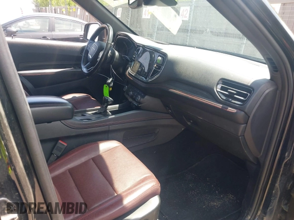 2023 Dodge Durango GT Plus with VIN 1C4RDJDGXPC688087, listed as a IAAI auction lot 42685018 with 58,999 mi miles and . Bid and sale history available at DreamBid. Image 5.