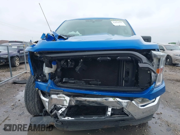 2021 Ford F-150 XL with VIN 1FTMF1EB3MKF07453, listed as a IAAI auction lot 42050992 with 26,398 mi miles and . Bid and sale history available at DreamBid. Image 12.