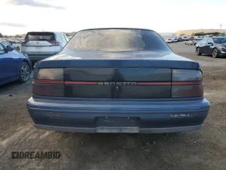 1996 Chevrolet Beretta z VIN 1G1LV15M8TY185316, wystawiony jako Copart lot #76835634 z przebiegiem 87 232 mil mil oraz Szkoda całkowita • Salvage title. Historia ofert i sprzedaży dostępna na DreamBid. Obrazek 6.