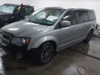2015 Dodge Grand Caravan SE with VIN 2C4RDGBG9FR703691, listed as a IAAI auction lot 41395564 with 170,735 mi miles and . Bid and sale history available at DreamBid. Image 2.