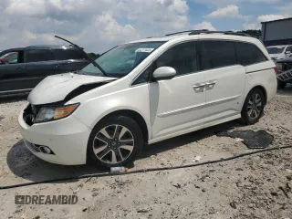 2014 Honda Odyssey Touring с VIN 5FNRL5H92EB020189, выставлен на аукционе Copart как лот 62311425 с пробегом Не указан миль и Чистый • Clean title. История ставок и продаж доступна на DreamBid. Изображение 1.