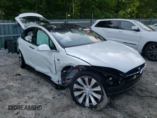 2020 Tesla Model X Long Range with VIN 5YJXCDE2XLF263903, listed as a Copart auction lot 52931311 with 0 mi miles and Salvage Title. Bid and sale history available at carsss.com. Image 1.