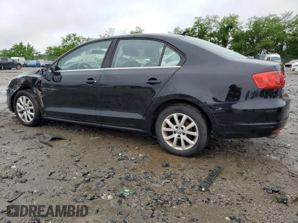 2013 Volkswagen Jetta SE with VIN 3VWDP7AJ4DM425976, listed as a Copart auction lot 58095525 with 77,395 mi miles and Salvage title. Bid and sale history available at DreamBid. Image 2.