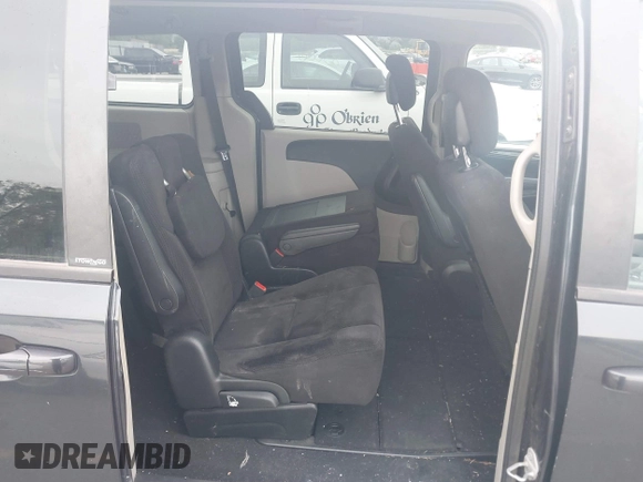 2014 Dodge Grand Caravan SXT z VIN 2C4RDGCG6ER206045, wystawiony jako IAAI lot #42289138 z przebiegiem 124 962 mil mil oraz . Historia ofert i sprzedaży dostępna na DreamBid. Obrazek 8.
