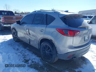 2013 Mazda CX-5 Grand Touring with VIN JM3KE4DE4D0168115, listed as a IAAI auction lot 41610004 with 190,690 mi miles. Bid and sale history available at carsss.com. Image 3.