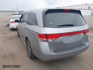 2016 Honda Odyssey Touring Elite with VIN 5FNRL5H96GB062318, listed as a IAAI auction lot 41660493 with 137,269 mi miles. Bid and sale history available at carsss.com. Image 3.