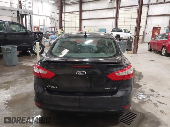 2014 Ford Focus Titanium with VIN 1FADP3J22EL199563, listed as a IAAI auction lot 41450106 with 129,271 mi miles. Bid and sale history available at carsss.com. Image 16.