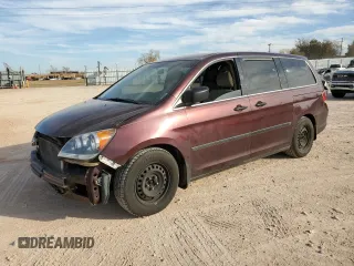 2009 Honda Odyssey LX z VIN 5FNRL38259B044998, wystawiony jako Copart lot #83059144 z przebiegiem 173 017 mil mil oraz Szkoda całkowita • Salvage title. Historia ofert i sprzedaży dostępna na DreamBid. Obrazek 1.