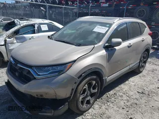 2018 Honda CR-V Touring with VIN 5J6RW1H98JL000031, listed as a IAAI auction lot 40605651 with 129,516 mi miles and . Bid and sale history available at DreamBid. Image 2.