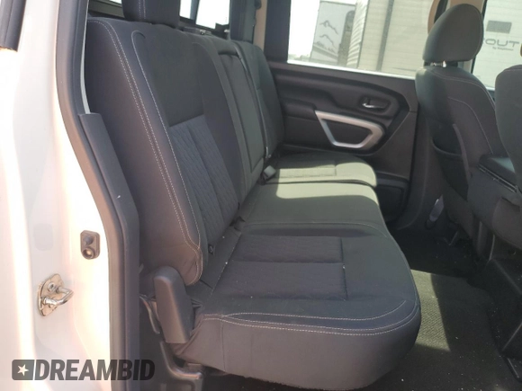 2018 Nissan Titan SV z VIN 1N6AA1EJ7JN542996, wystawiony jako Copart lot #50969835 z przebiegiem 89 664 mil mil oraz Szkoda całkowita • Salvage title. Historia ofert i sprzedaży dostępna na DreamBid. Obrazek 10.
