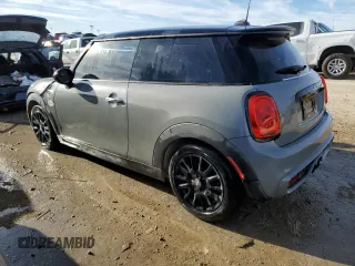 2014 MINI Hardtop S with VIN WMWXM7C57ET987816, listed as a Copart auction lot 41115434 with 122,724 mi miles and Salvage title. Bid and sale history available at DreamBid. Image 2.