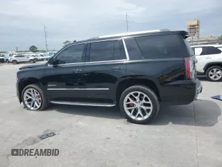 2017 GMC Yukon Denali with VIN 1GKS1CKJ9HR211240, listed as a Copart auction lot 50973015 with 95,484 mi miles and Salvage Title. Bid and sale history available at carsss.com. Image 2.