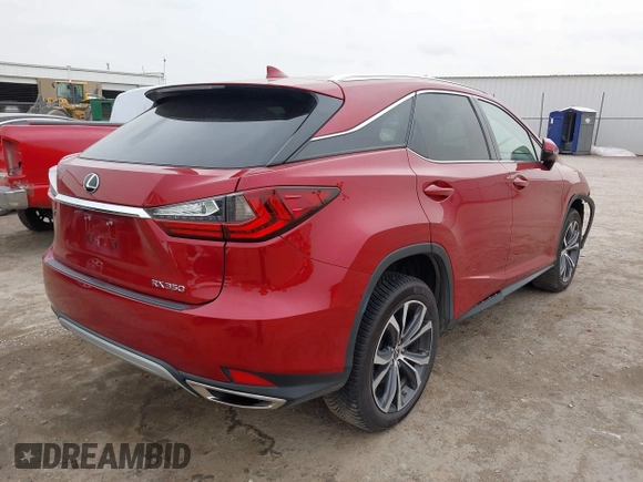 2022 Lexus RX 350 with VIN JTJHZMDAXN2058225, listed as a IAAI auction lot 42059802 with 63,407 mi miles and . Bid and sale history available at DreamBid. Image 4.